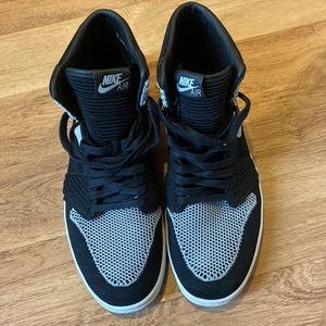 The Air Jordan 1 Retro High OG Flyknit. No rips tears in great condition